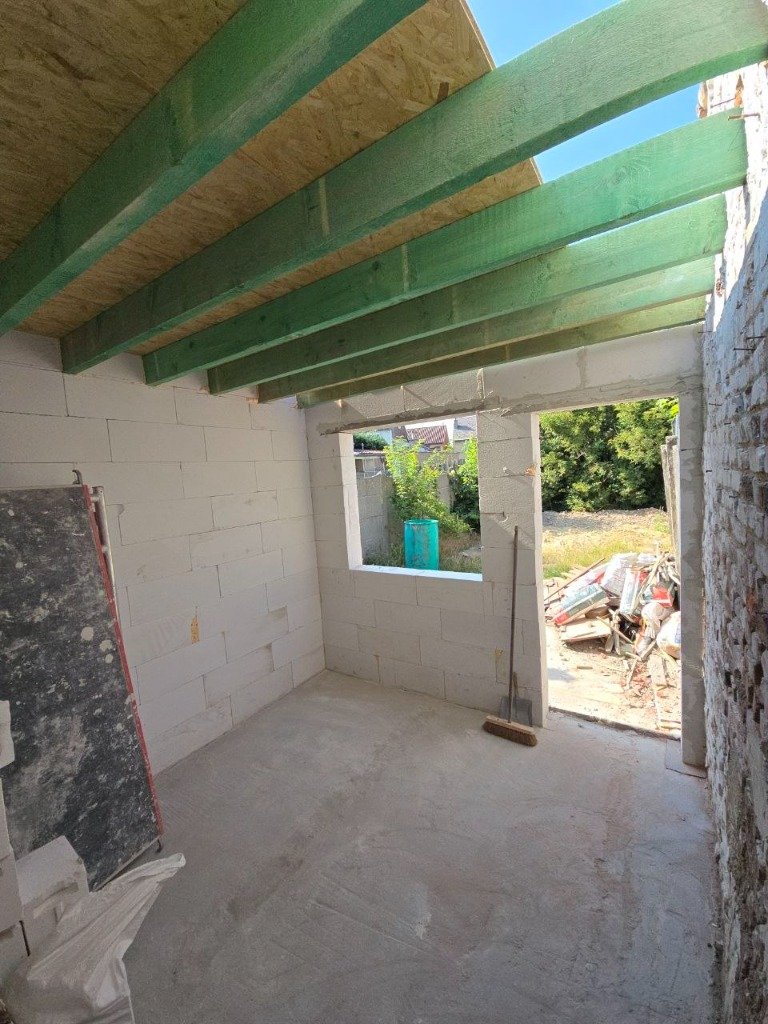 Construction d'extension en blocs et solivage bois à Bruxelles